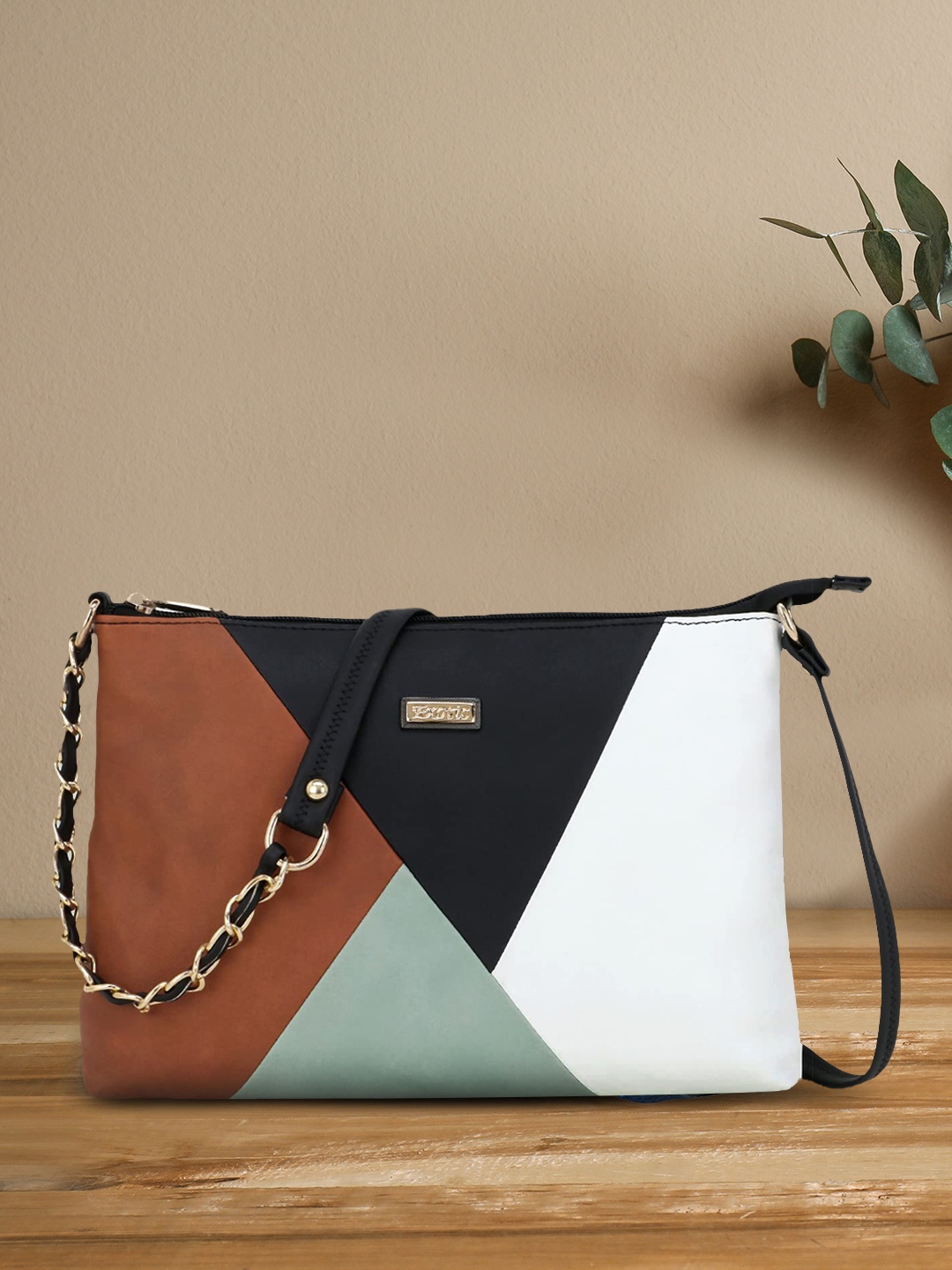 

Exotic Black Colourblocked PU Structured Sling Bag