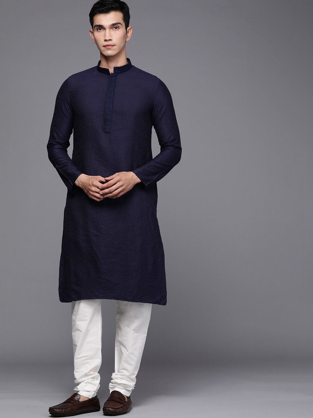 

Manu Men Navy Blue & White Embroidered Kurta with Churidar