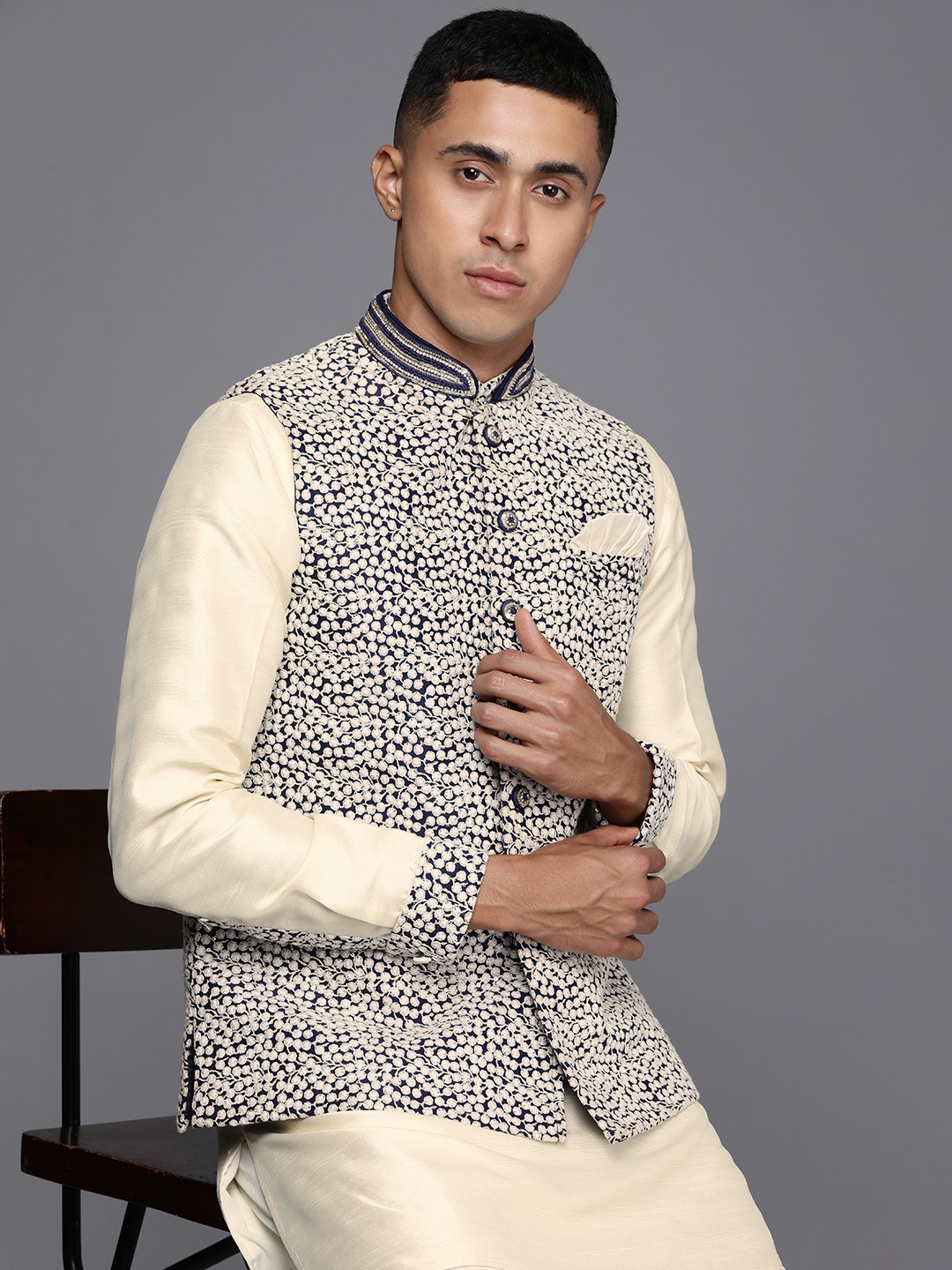 

Manu Solid Mandarin-Collar Kurta with Churidar & Nehru Jacket, Cream