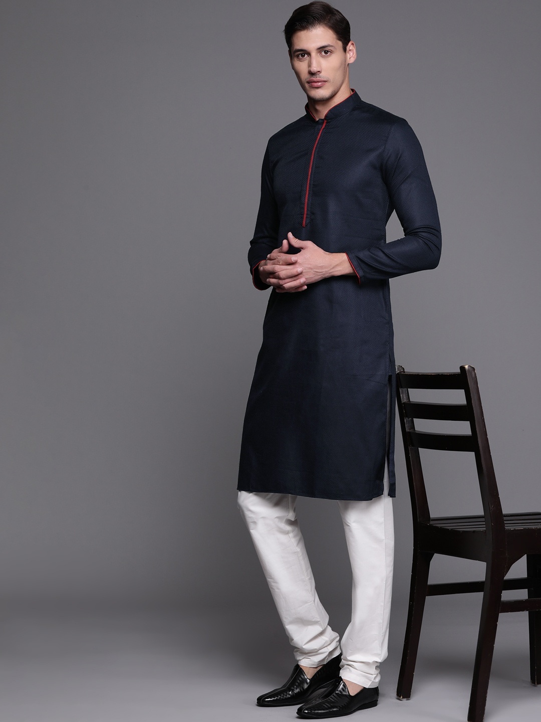 

Manu Men Navy Blue Kurta with Churidar & Nehru Jacket