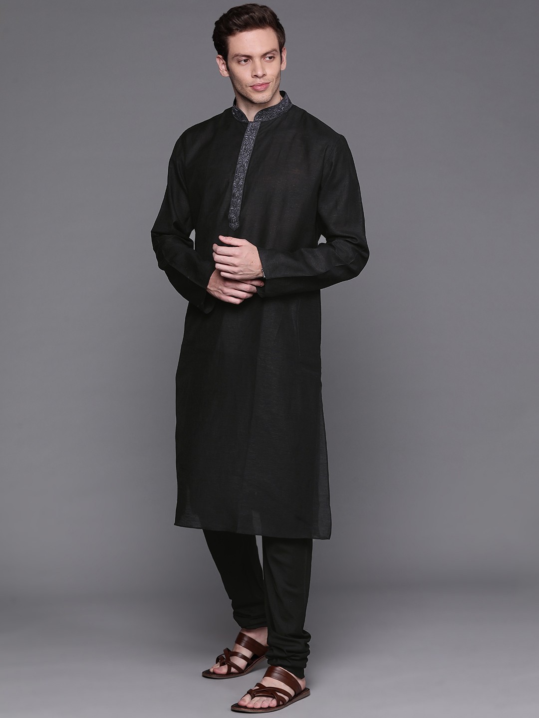 

Manu Men Black Solid Kurta & Churidar With Embroidered Details