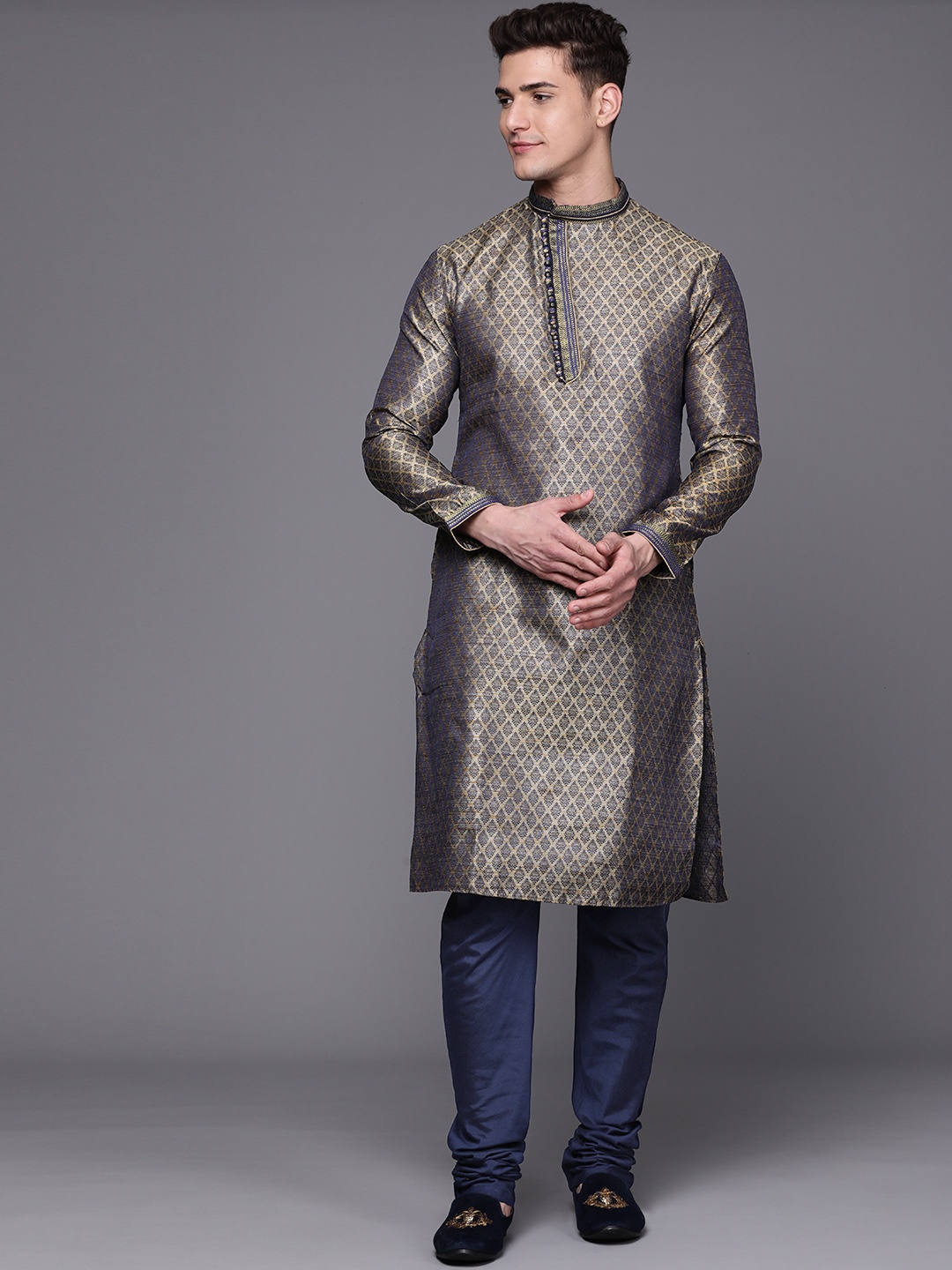 

Manu Men Gold-Toned Ethnic Motifs Thread Work Kurta with Churidar