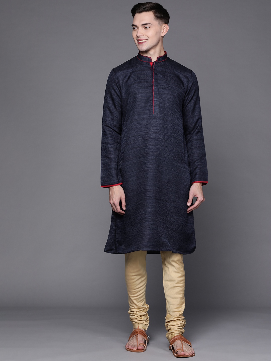 

Manu Men Navy Blue Ethnic Motifs Thread Work Kurta with Churidar