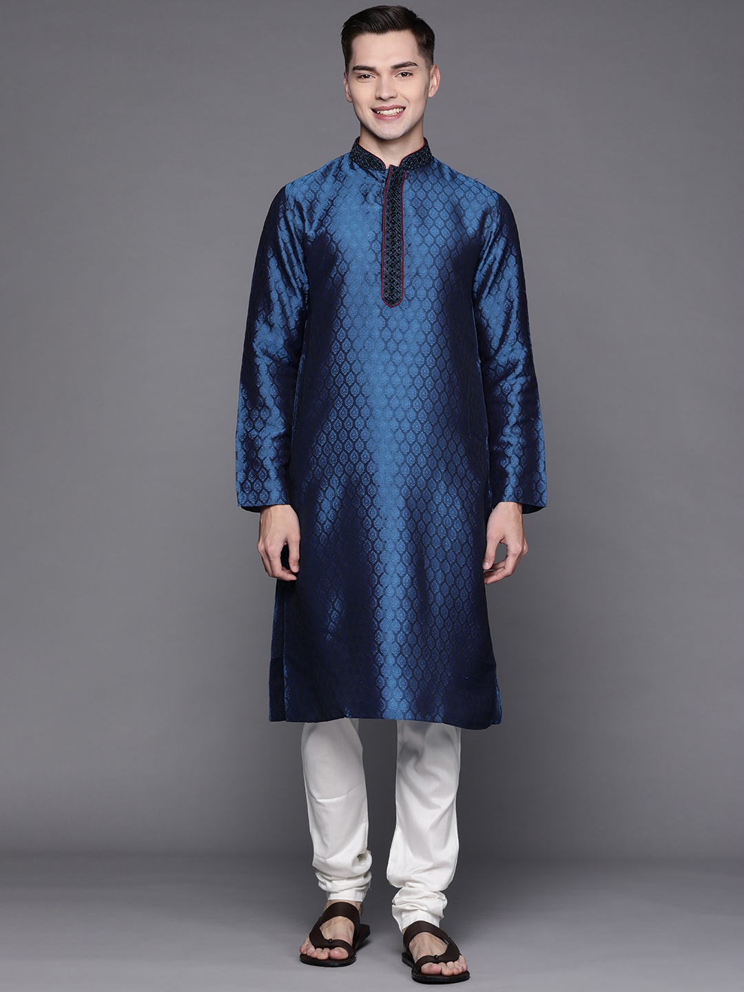 

Manu Men Navy Blue Thread Work Kurta with Churidar