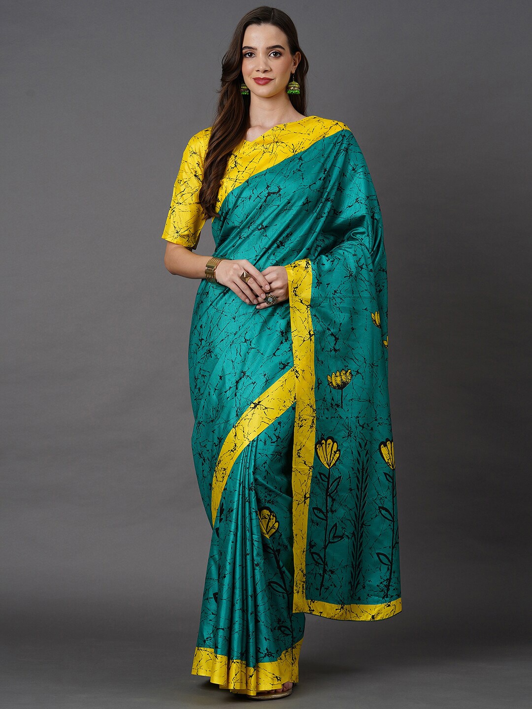 

Mitera Teal & Yellow Btaik Printed Silk Blend Saree
