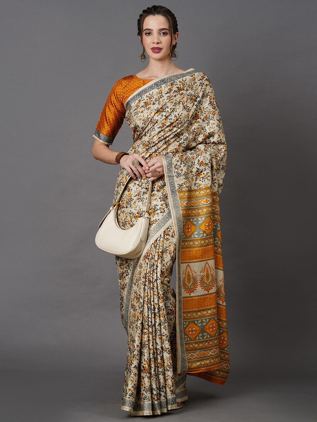 

Mitera Beige & Yellow Ethnic Motifs Saree