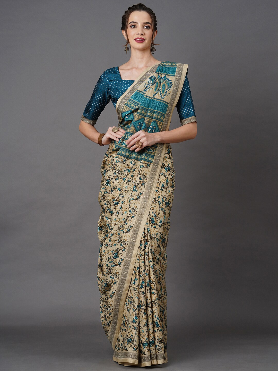 

Mitera Beige & Teal Floral Poly Silk Saree