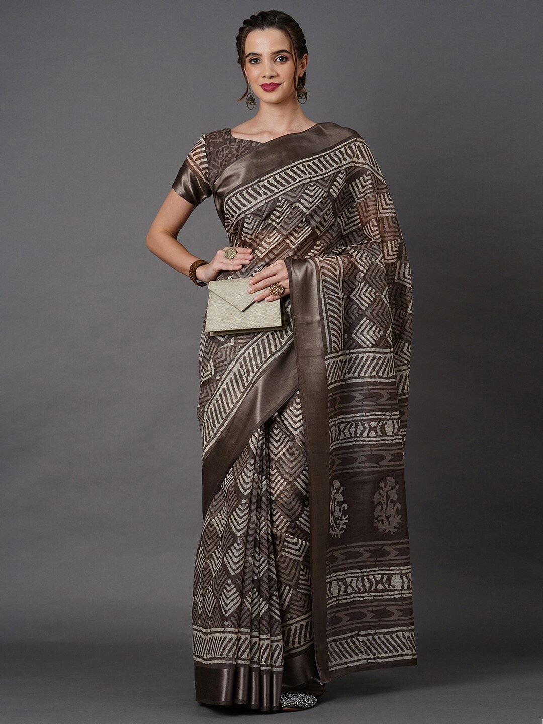 

Mitera Brown & Off White Saree