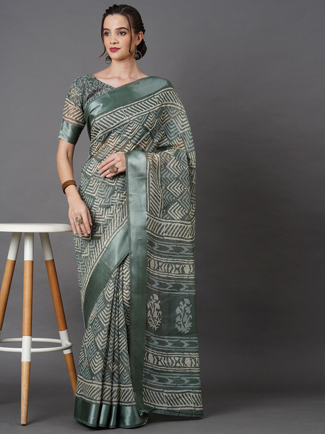 

Mitera Olive Green Ethnic Motifs Saree