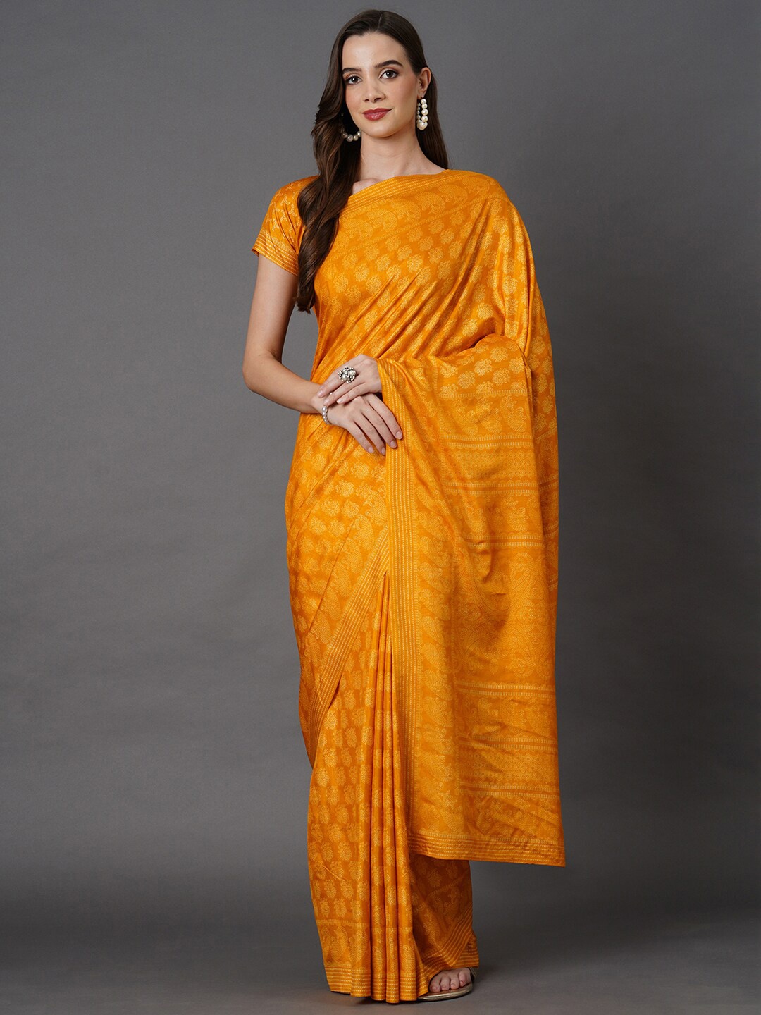 

Mitera Mustard Ethnic Motifs Art Silk Saree