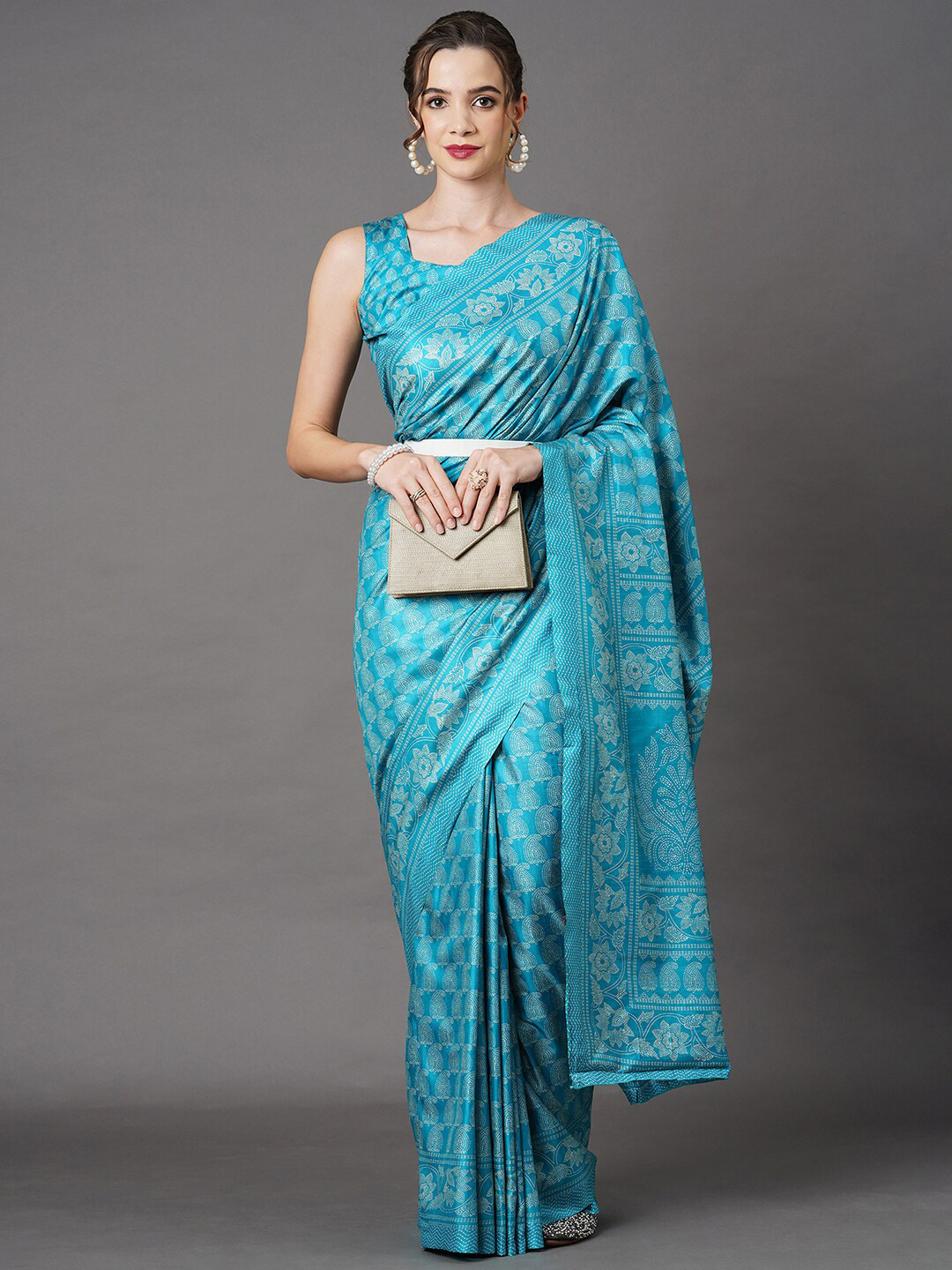 

Mitera Turquoise Blue & White Floral Art Silk Saree
