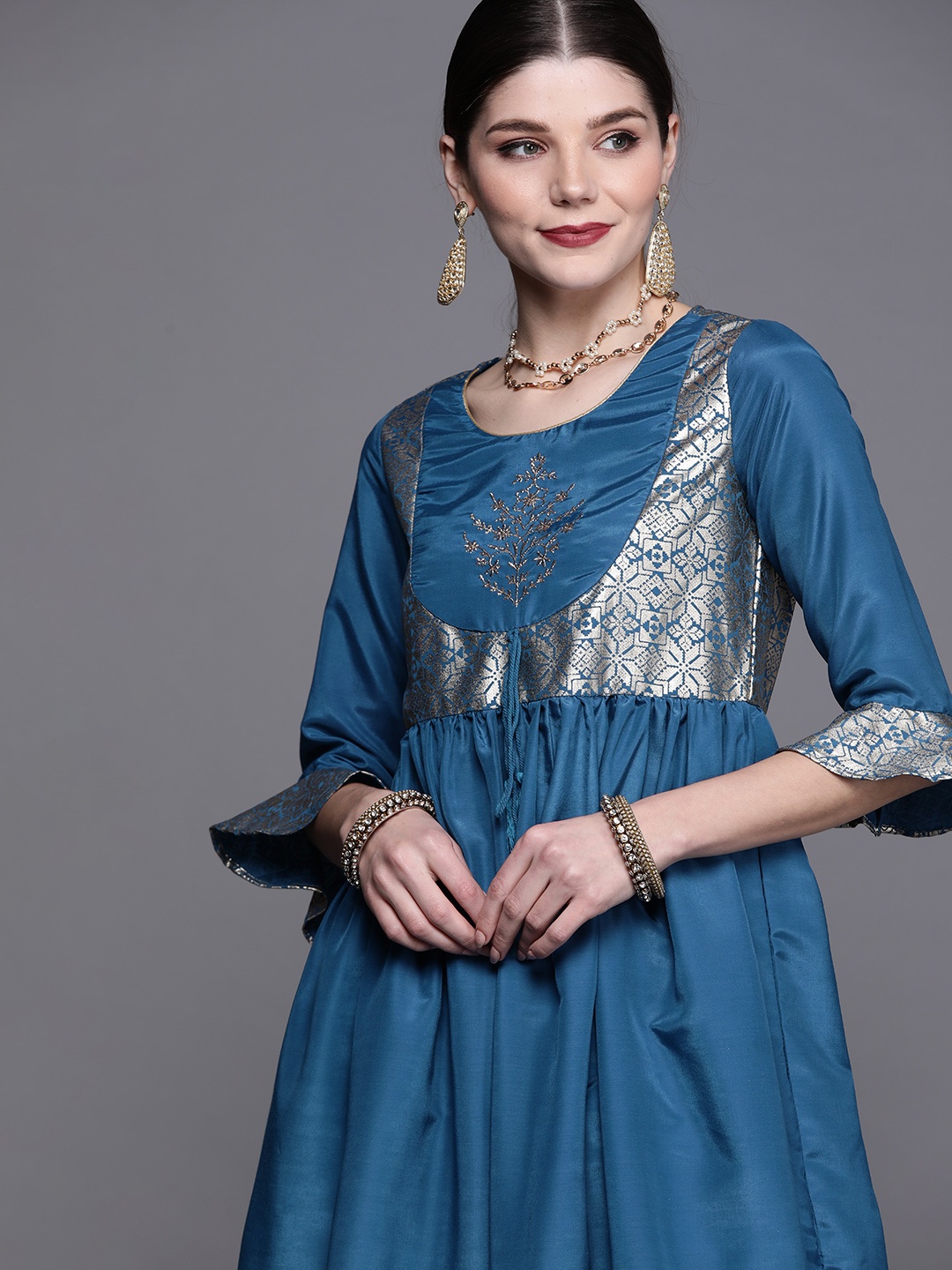 

Biba Women Teal Blue & Golden Ethnic Motifs Yoke Design A-Line Kurta