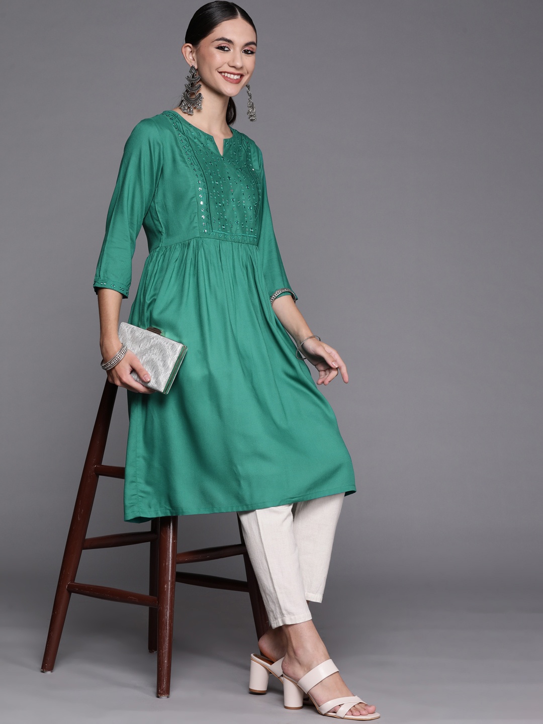 

Biba Women Teal Green Mirror Work Solid A-Line Kurta