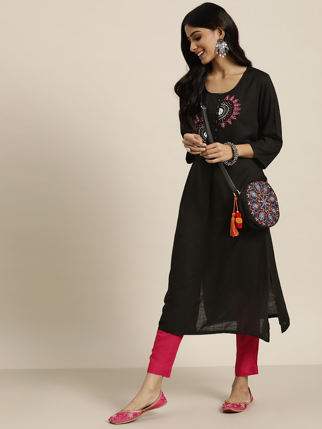 

Sangria Women Black & Pink Ethnic Motifs Embellished Kurta