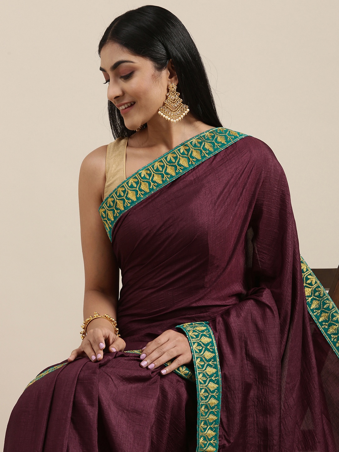 

Mitera Burgundy Embroidered Vichitra Art Silk Saree