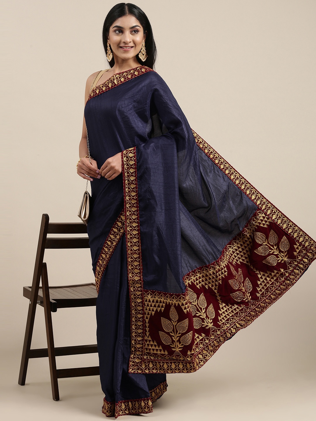 

Mitera Navy Blue Embroidered Vichitra Art Silk Saree