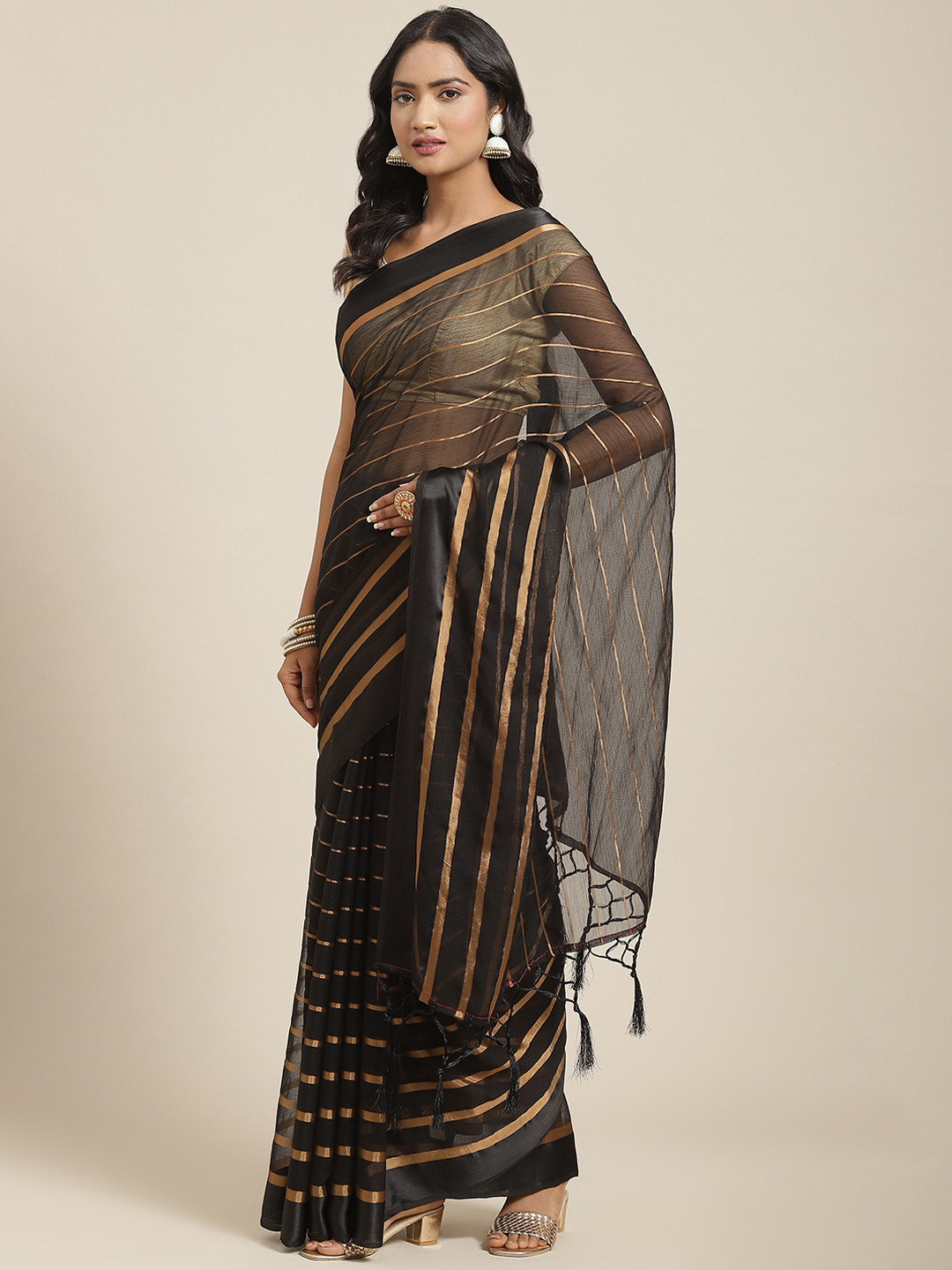 

Nanda Silk Mills Black & Golden Striped Pure Chiffon Saree
