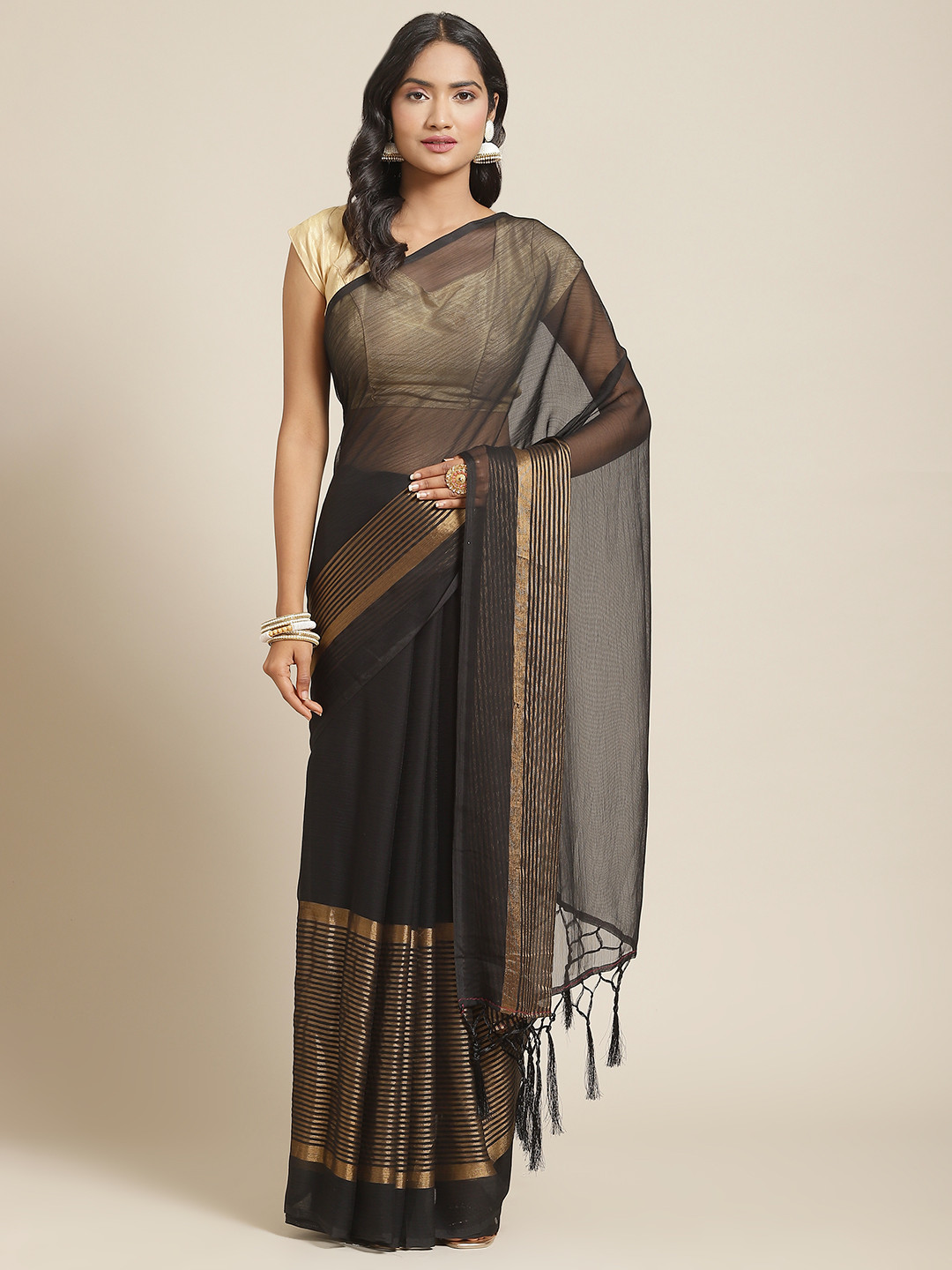 

Nanda Silk Mills Black & Gold-Toned Solid Pure Chiffon Saree