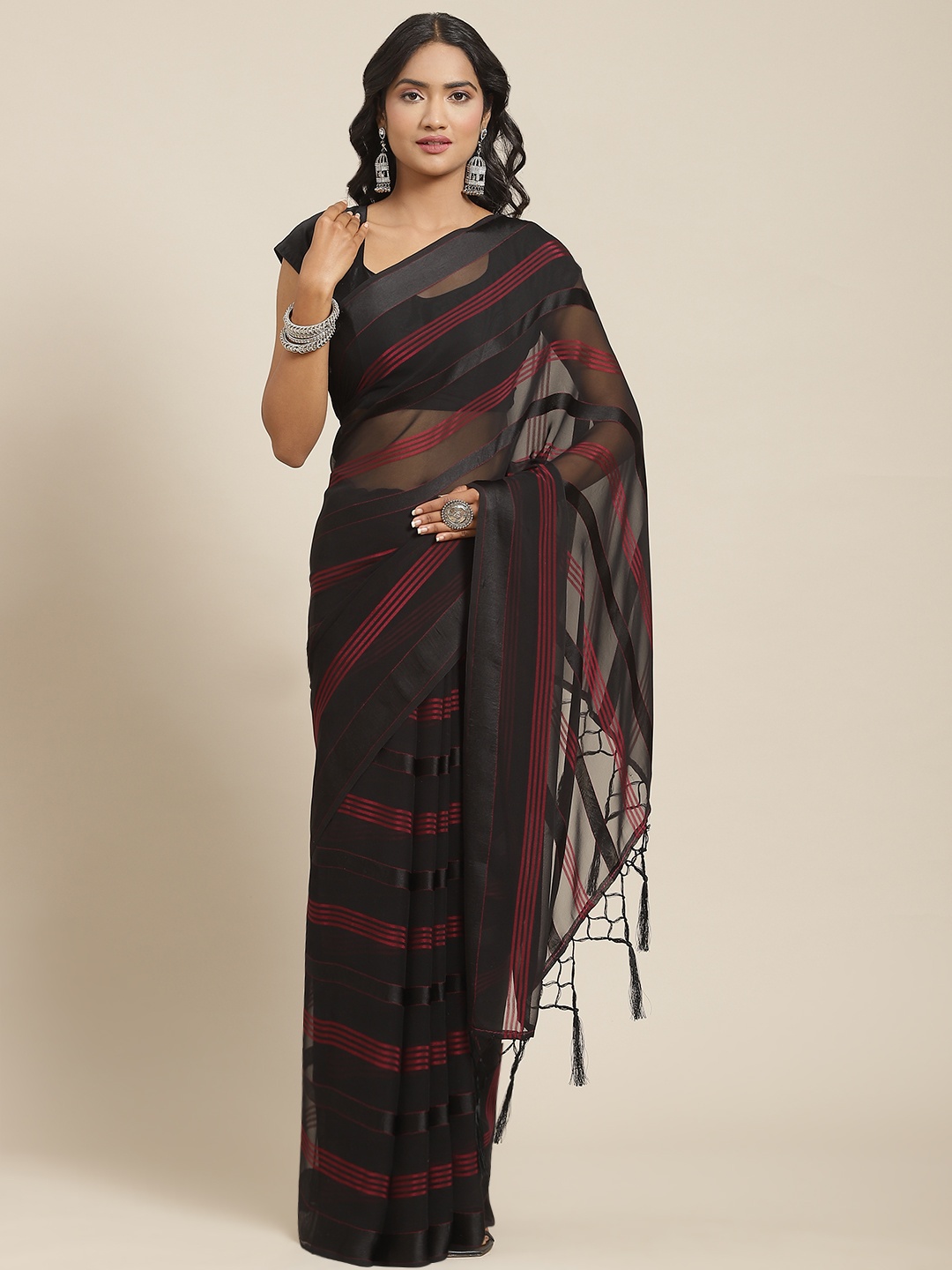

Nanda Silk Mills Black & Magenta Striped Saree