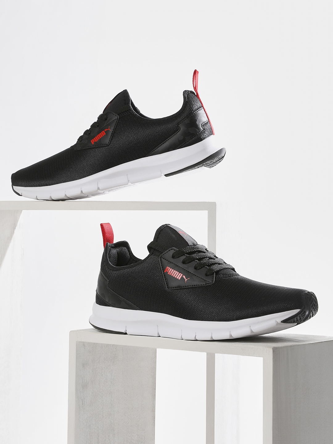 

Puma Men Black Solid Sneakers