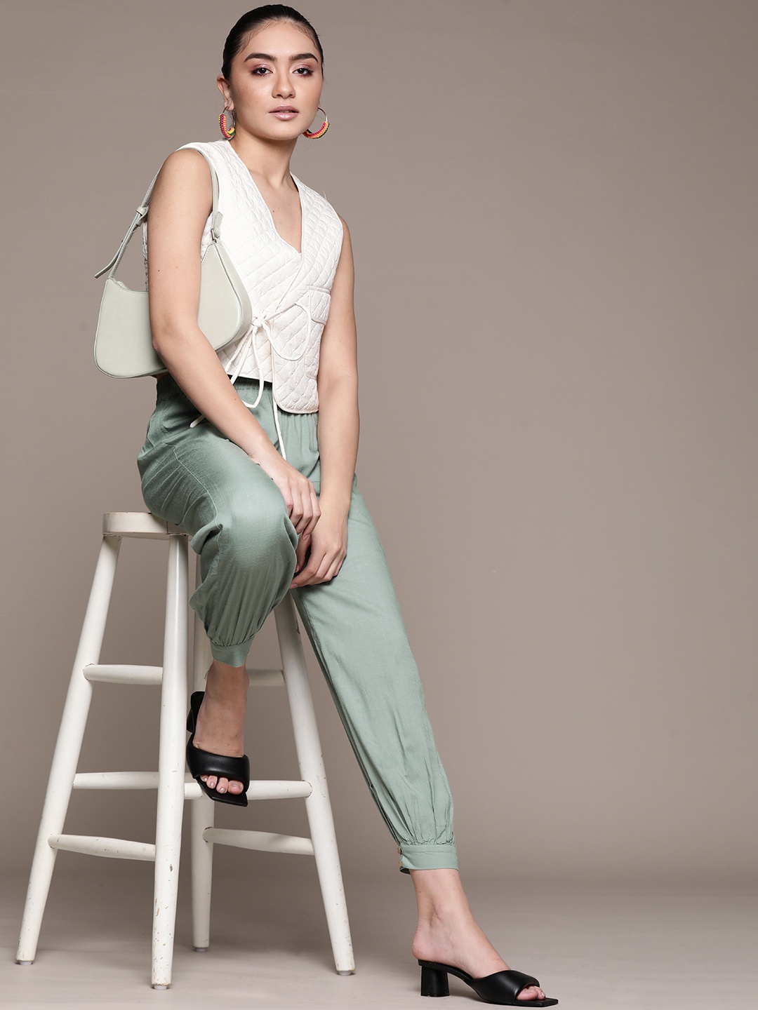 

aarke Ritu Kumar Women Sea Green Solid Pleated Joggers