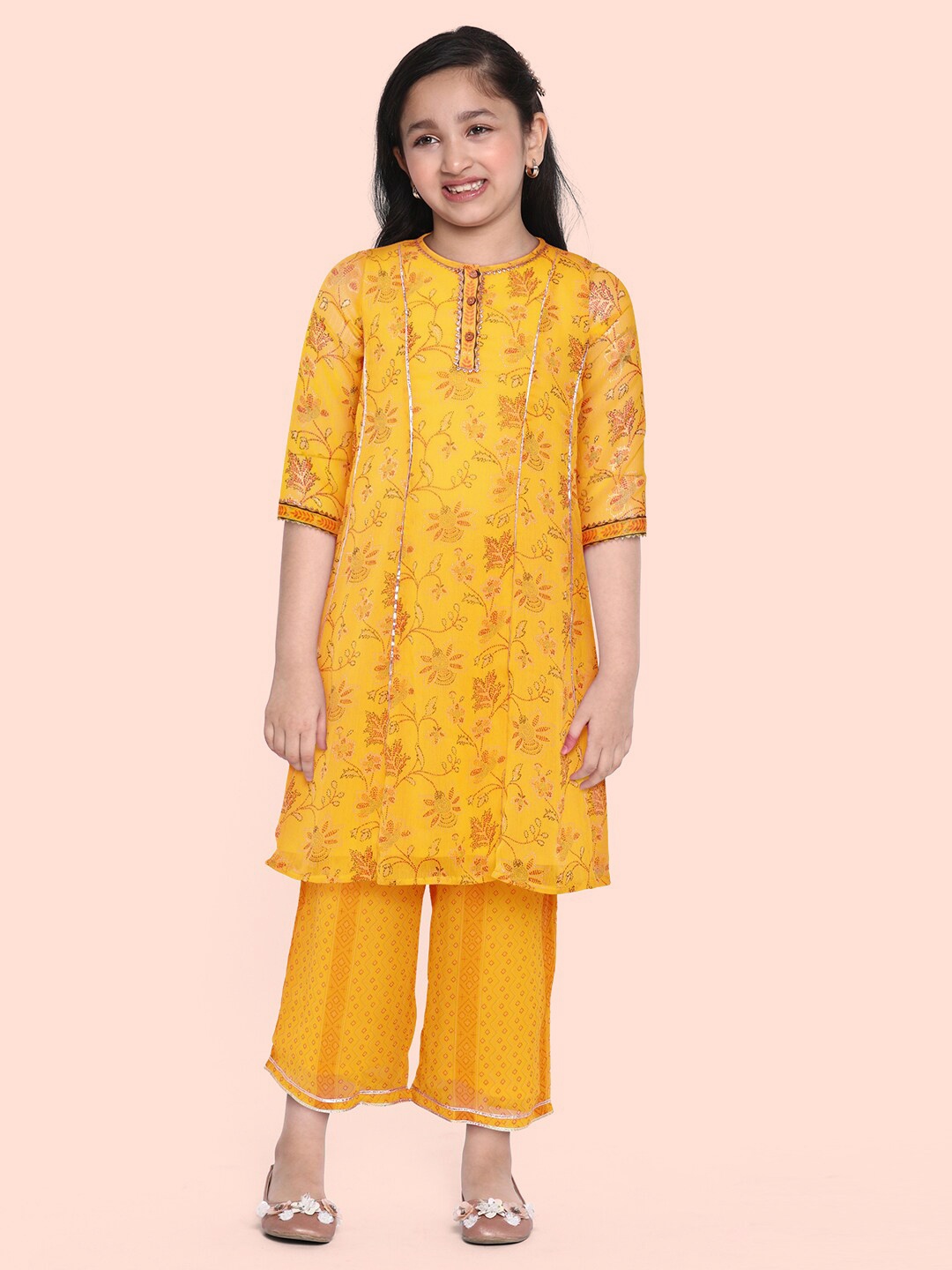 

Global Desi Girls Yellow Woven Design Kurta with Pyjamas