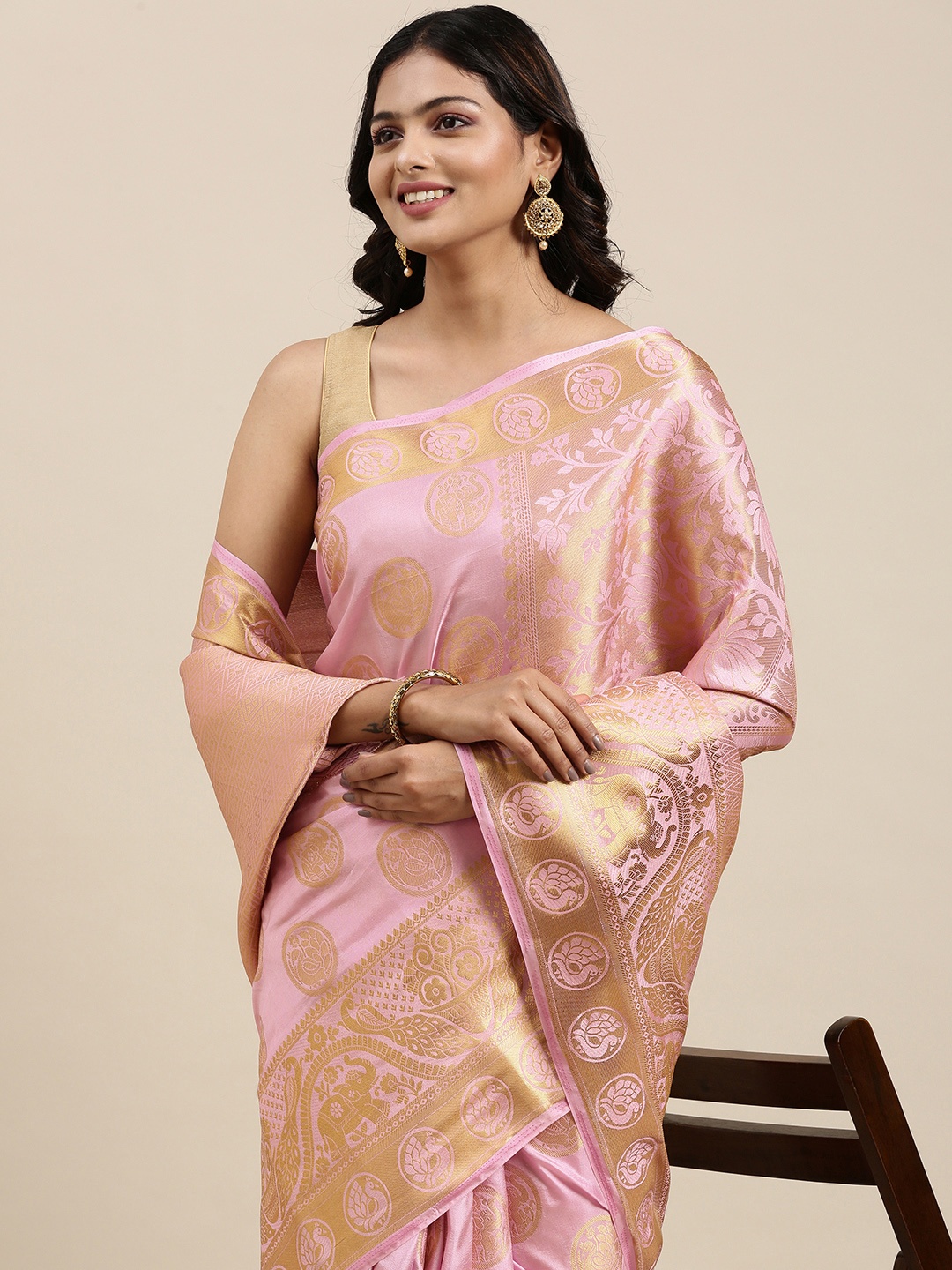 

Mitera Pink & Golden Ethnic Woven Design Pure Georgette Saree