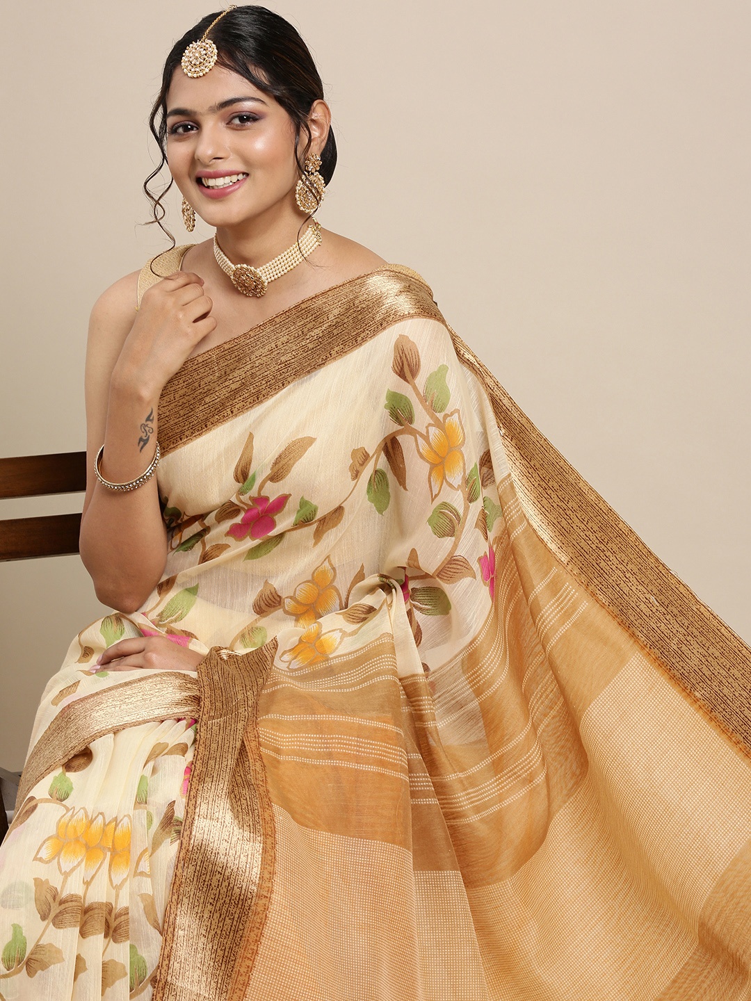 

Mitera Beige & Green Floral Pure Georgette Saree