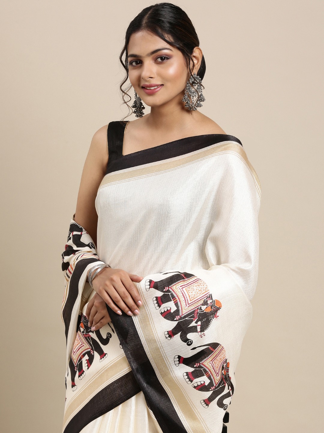 

Mitera Black & White Ethnic Motifs Pure Georgette Saree