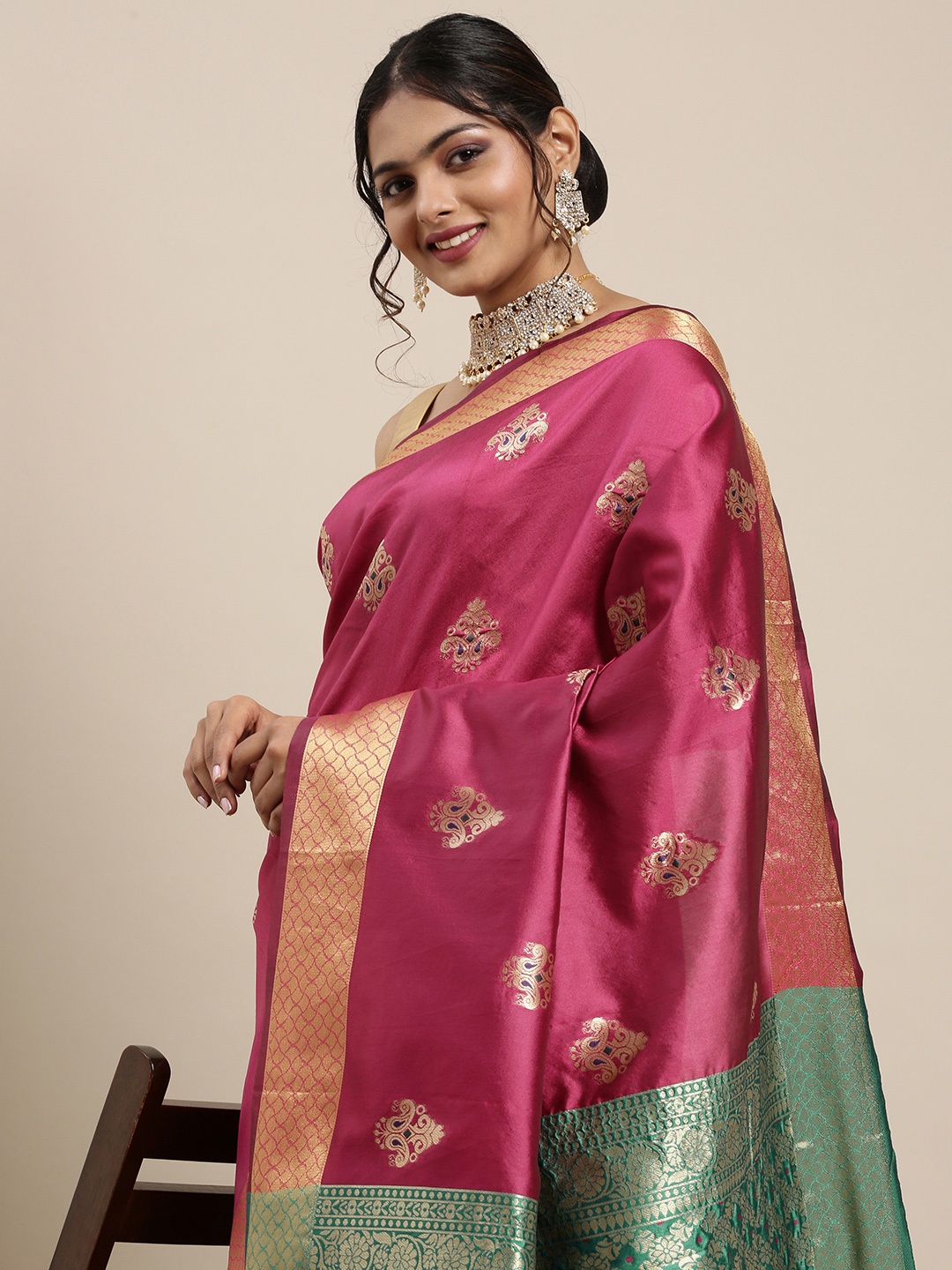 

Mitera Pink & Golden Ethnic Woven Design Pure Georgette Saree