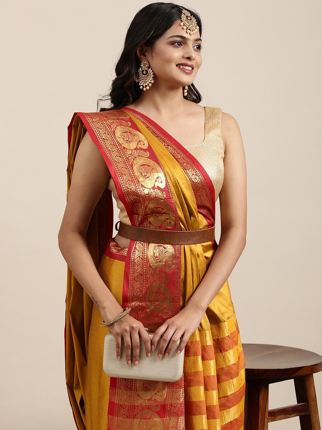 

Mitera Women Mustard Yellow & Red Ethnic Motifs Printed Saree