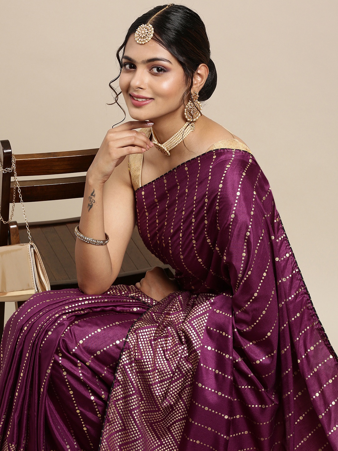 

Mitera Burgundy & Golden Striped Pure Georgette Saree