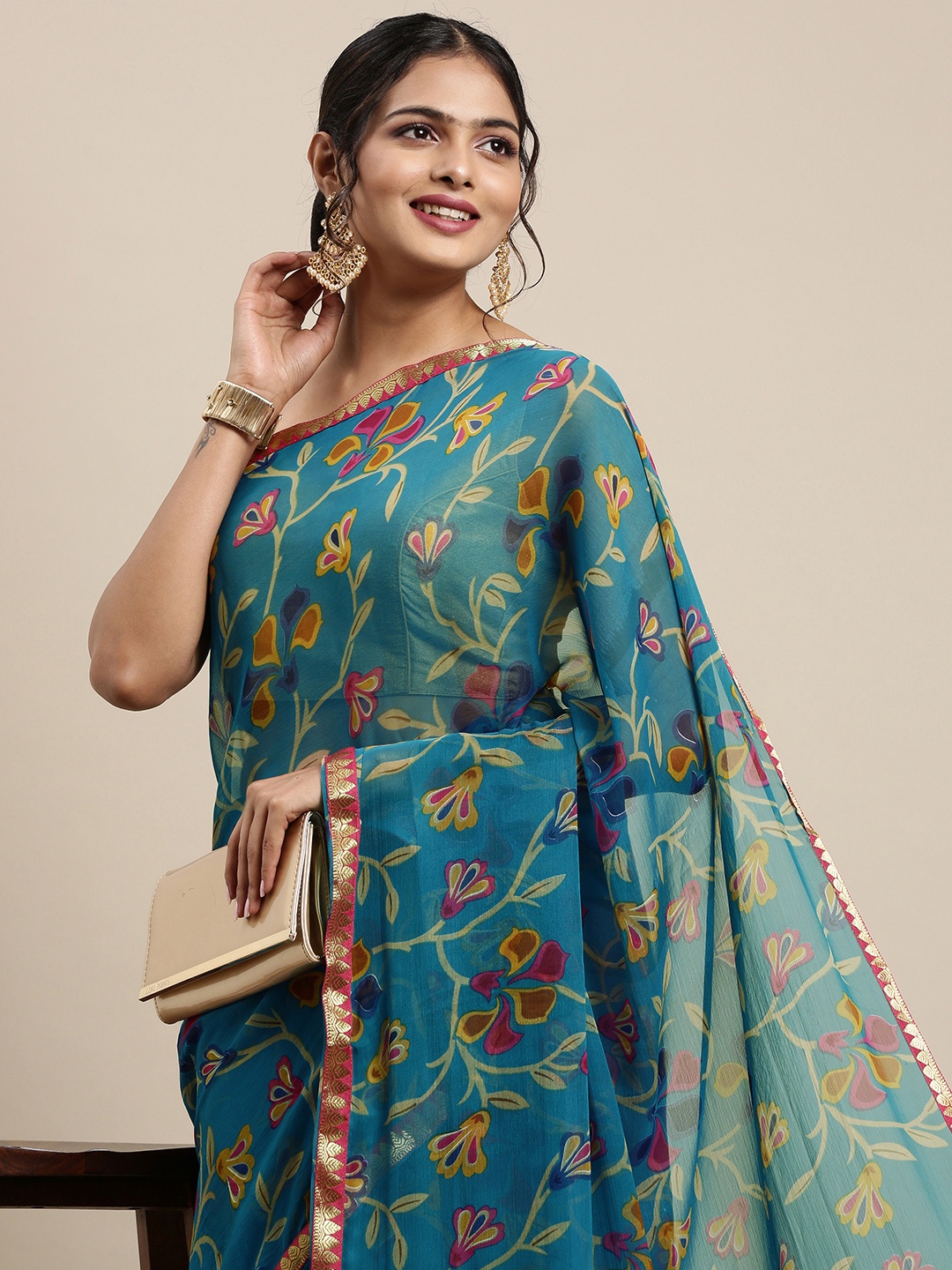 

Mitera Blue & Mustard Yellow Ethnic Printed Pure Georgette Saree