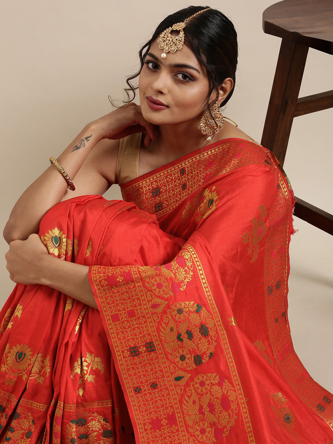 

Mitera Red & Golden Ethnic Woven Design Pure Georgette Saree