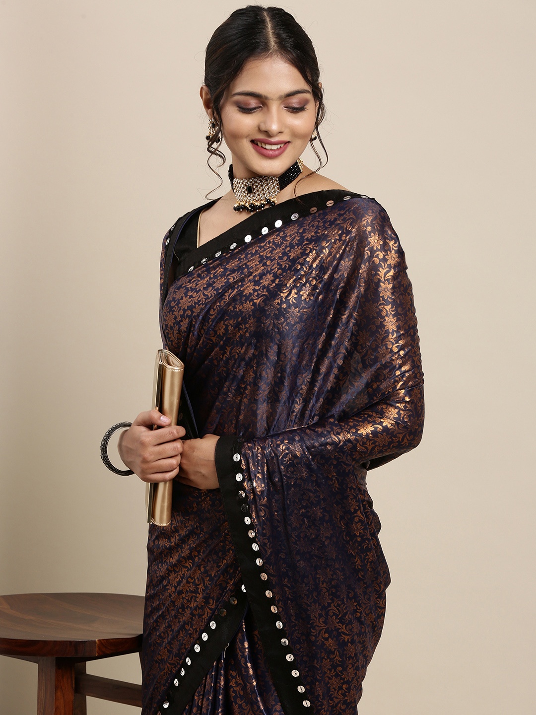 

Mitera Navy Blue & Golden Ethnic Printed Sequinned Pure Georgette Saree