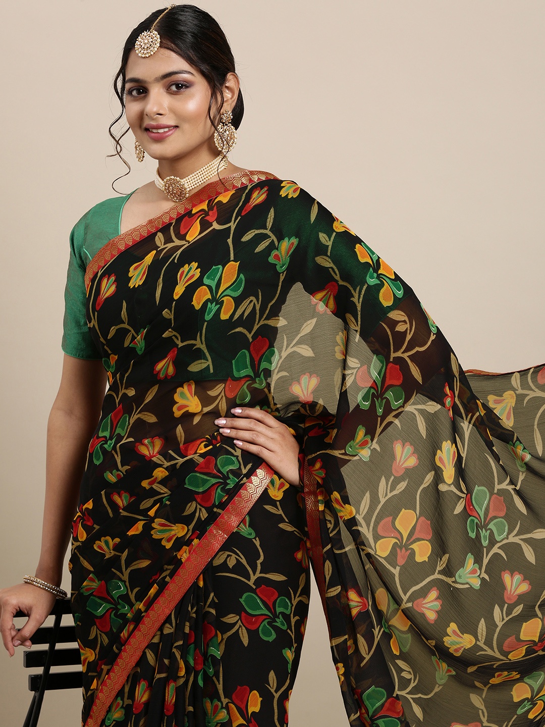 

Mitera Black & Mustard Yellow Ethnic Printed Pure Georgette Saree