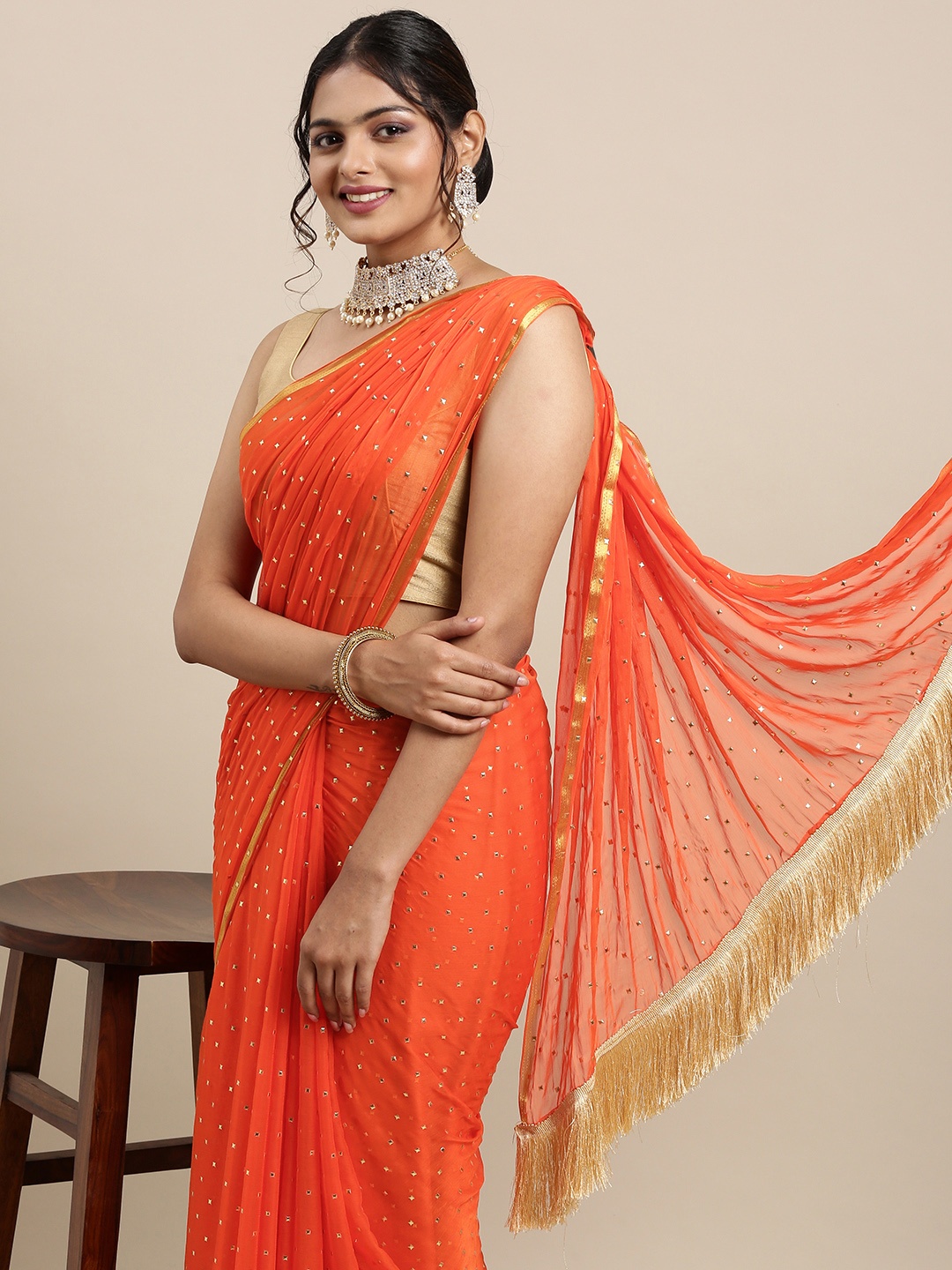 

Mitera Orange Embellished Beads and Stones Pure Georgette Saree
