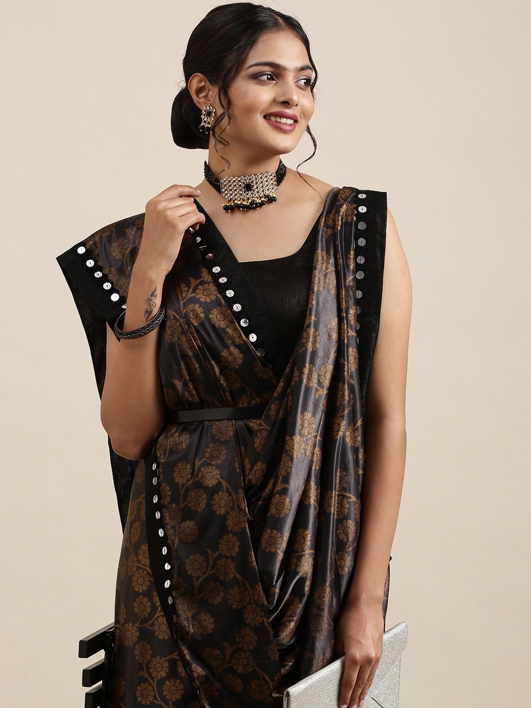 

Mitera Black & Brown Floral Printed Sequinned Pure Georgette Saree