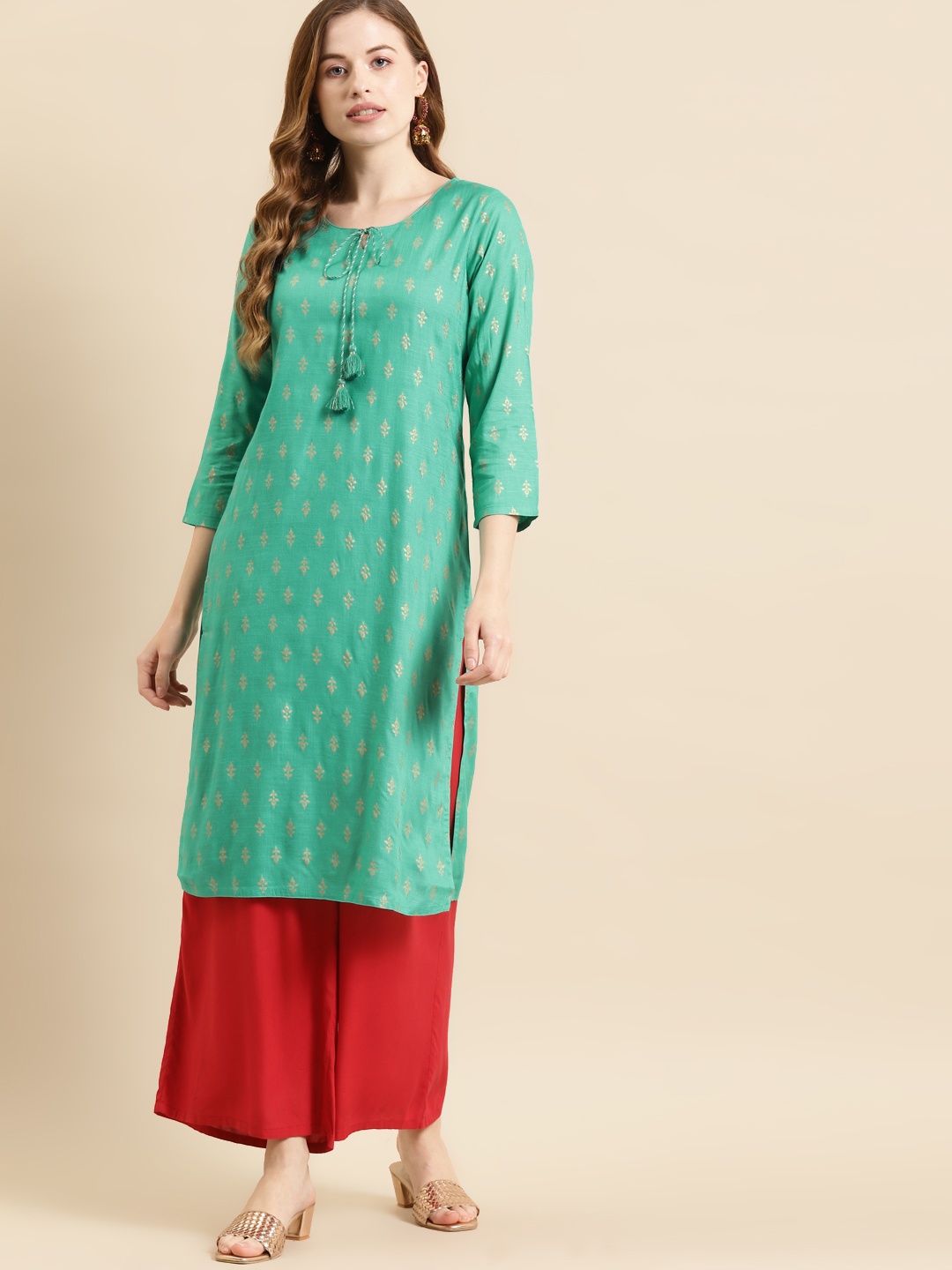 

Prakrti Women Sea Green & Gold-Toned Floral Print Kurta