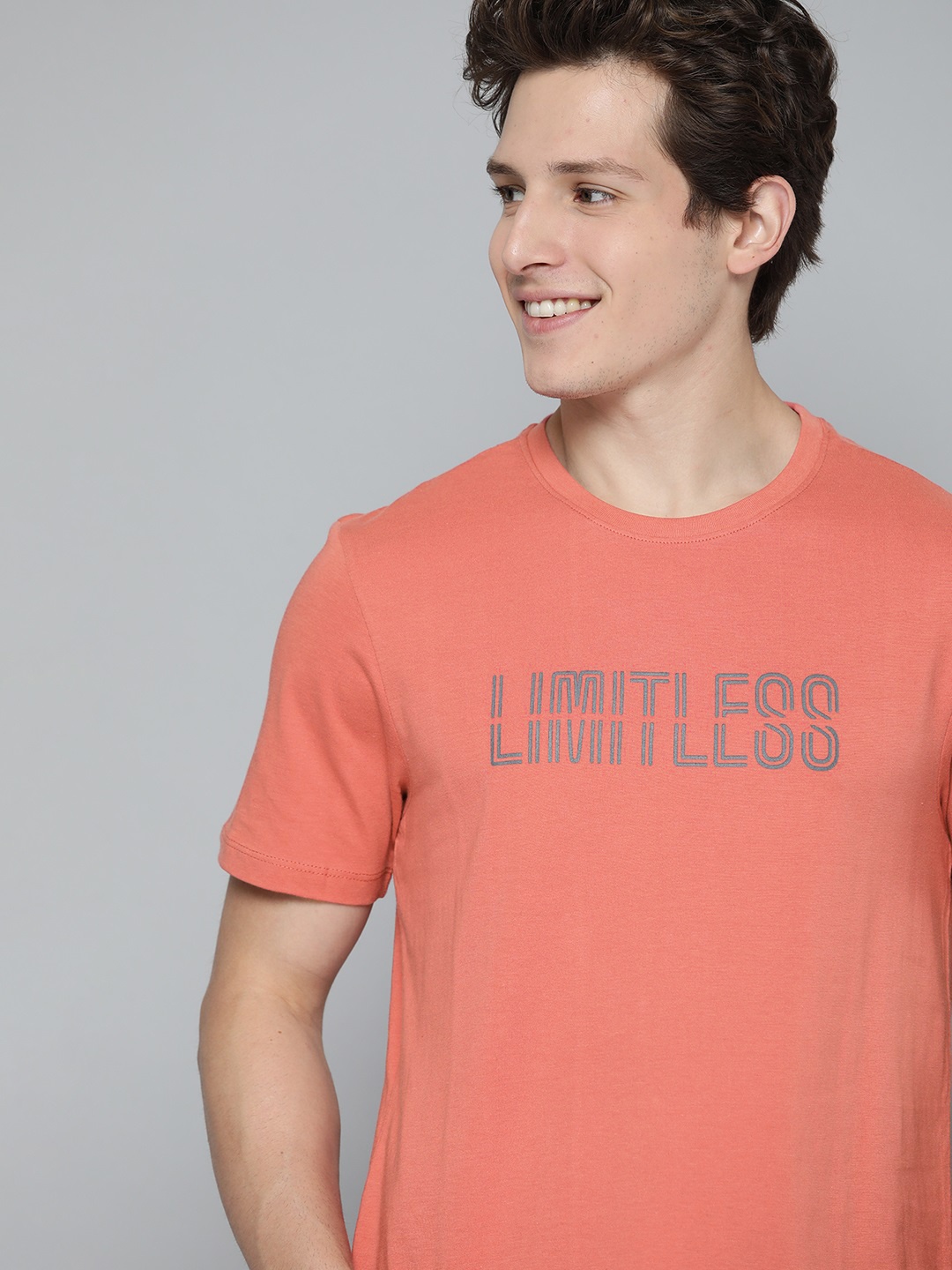

Mast & Harbour Men Coral Red Typography Printed Pure Cotton T-shirt