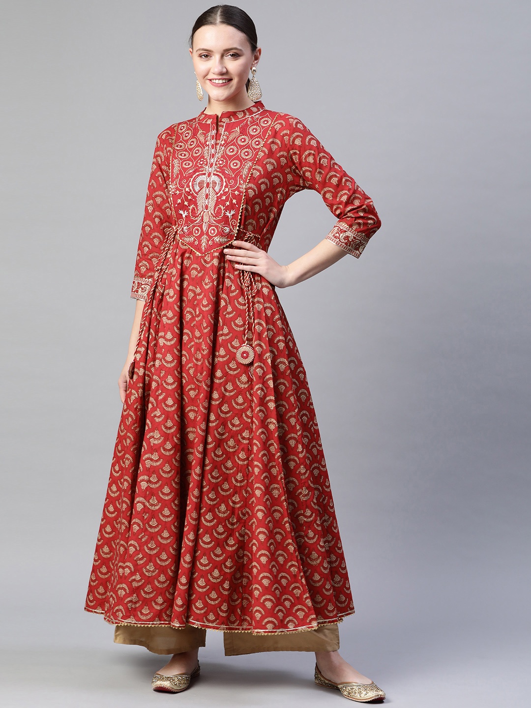 

Readiprint Fashions Women Red & Beige Ethnic Motifs Printed Cotton Tie-Ups Anarkali Kurta