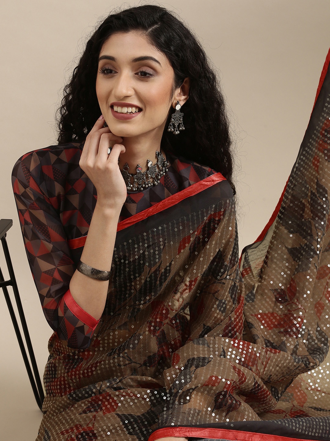 

Mitera Beige Sequinned Pure Georgette Saree