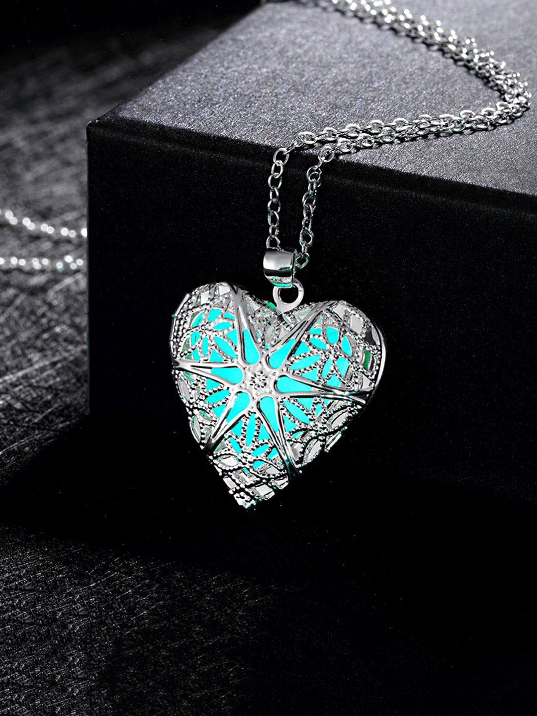 

Yellow Chimes Silver-Toned & Blue Glow In The Dark Heart-Shaped Pendant & Chain