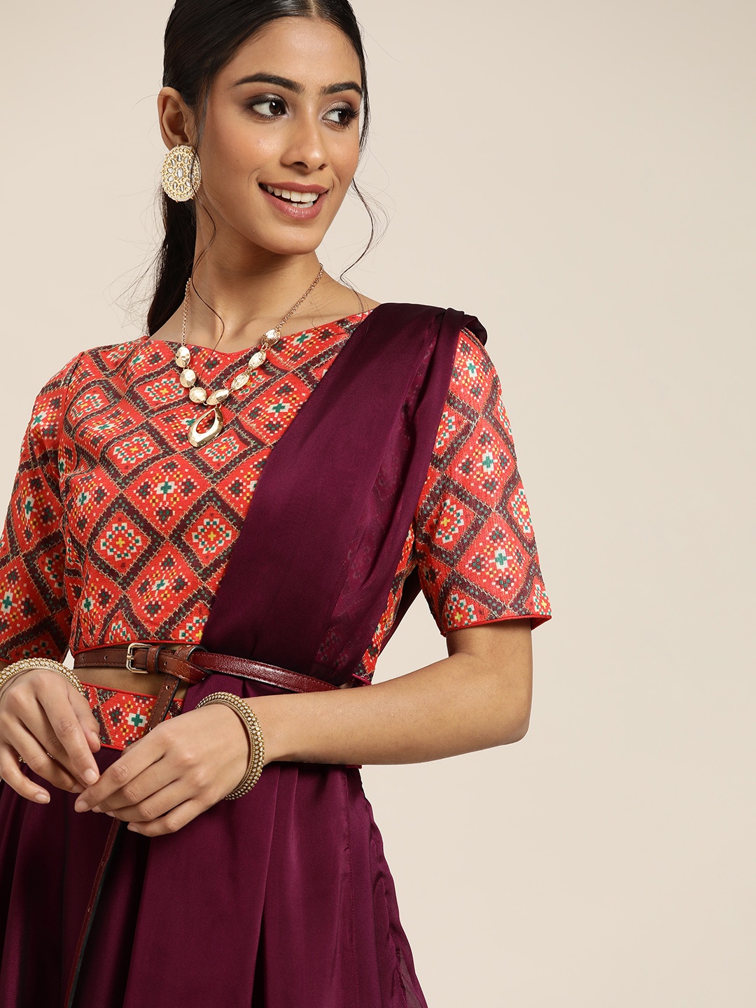 

Sangria Purple & Red Printed Semi-Stitched Lehenga with Unstitched Blouse & Dupatta