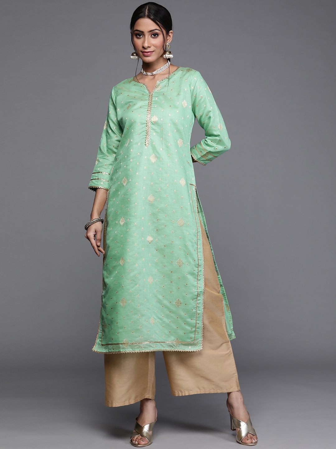 

Libas Women Green & Gold-Toned Ethnic Motifs Woven Design Gotta Patti Chanderi Silk Kurta