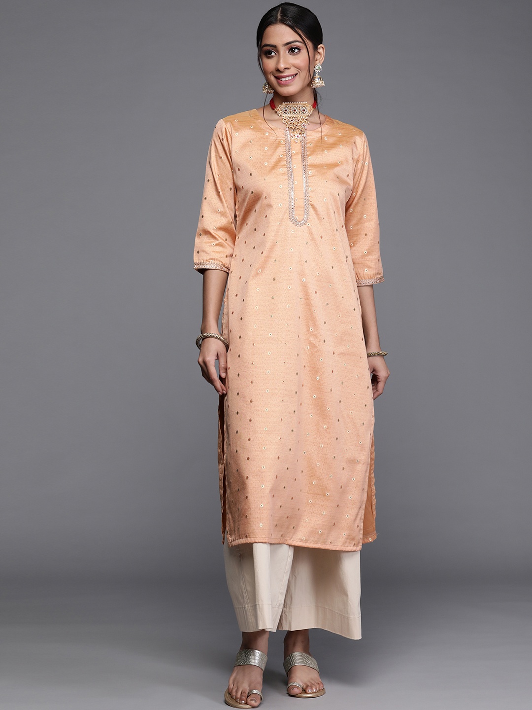 

Libas Women Orange & Gold Ethnic Motifs Woven Design Chanderi Silk Straight Kurta
