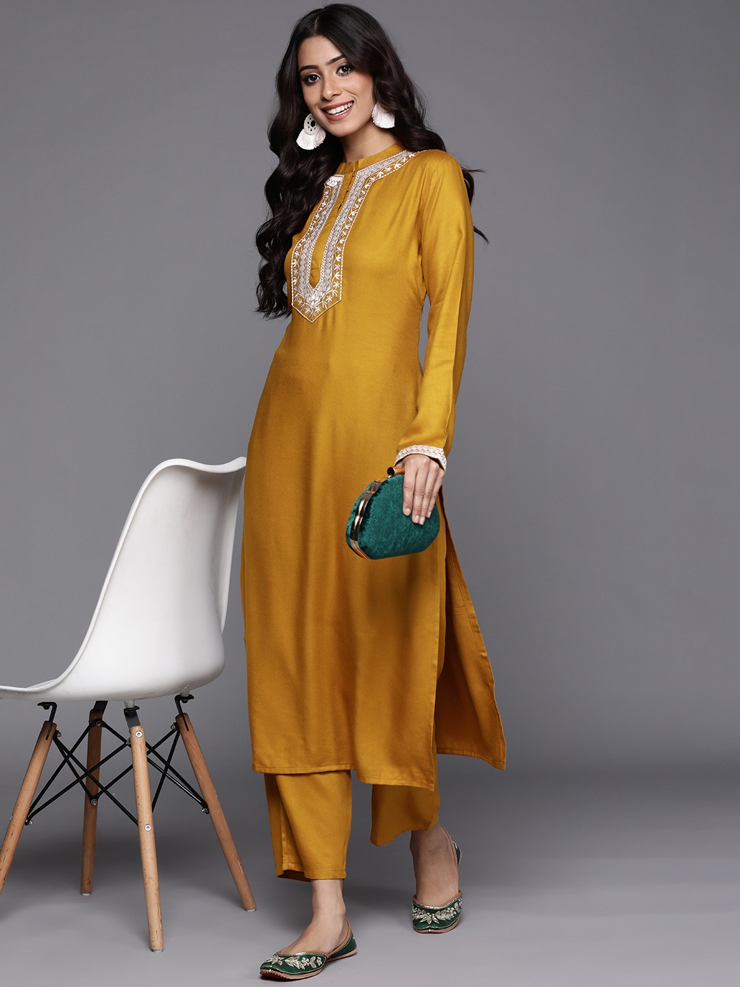 

Libas Women Mustard Yellow & White Yoke Ethnic Motifs Pashmina Wool Kurta Trousers