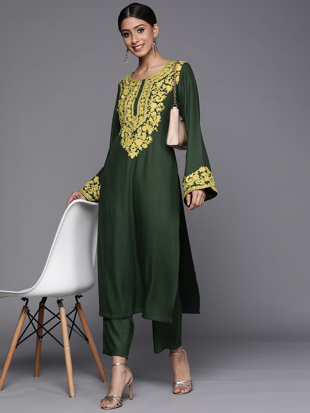 

Libas Women Green Ethnic Motifs Yoke Design Flared Sleeves Thread Work Floral Kurta
