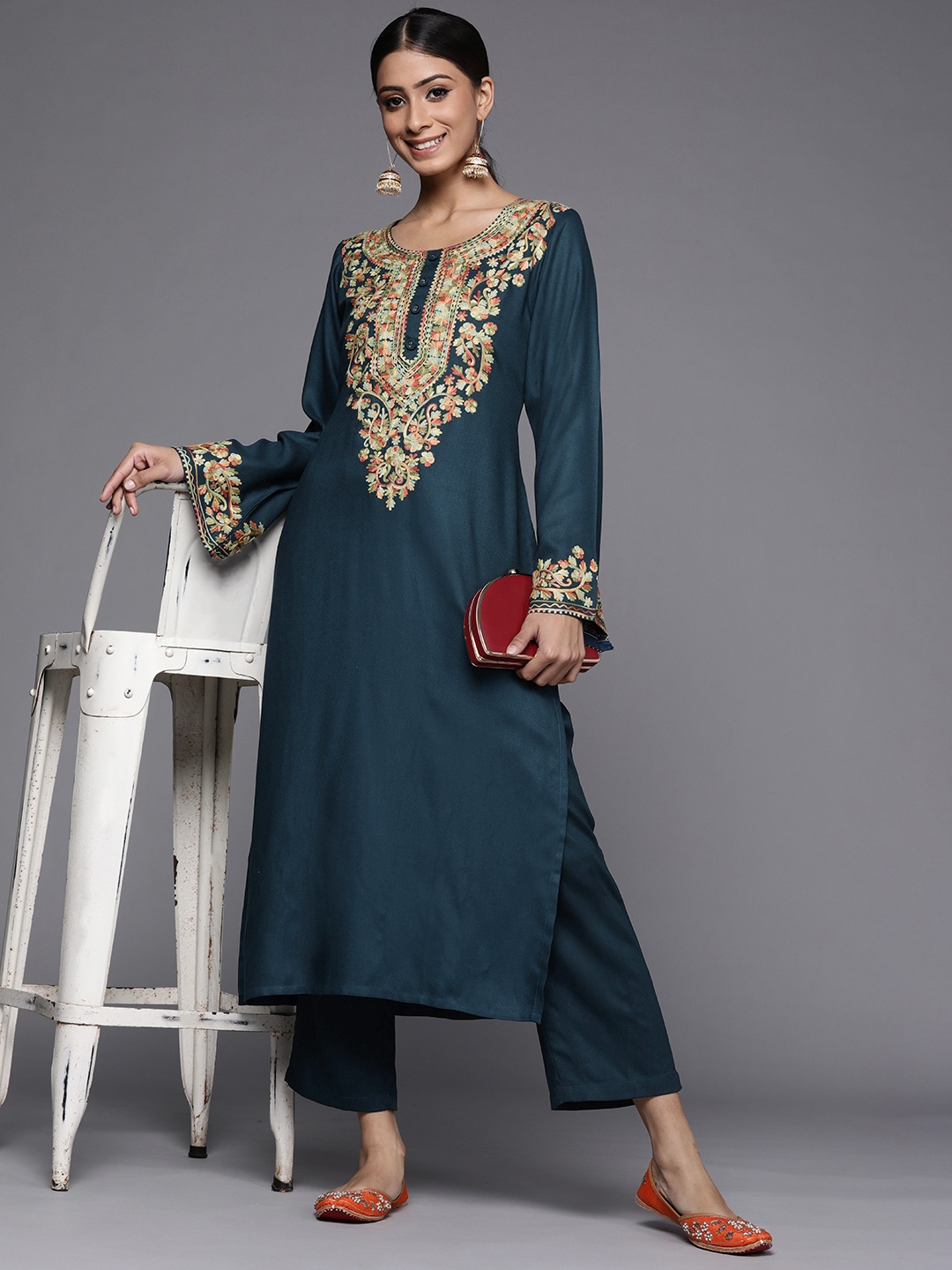 

Libas Women Teal & Beige Floral Yoke Design Flared Sleeves Thread Work Floral Kurta