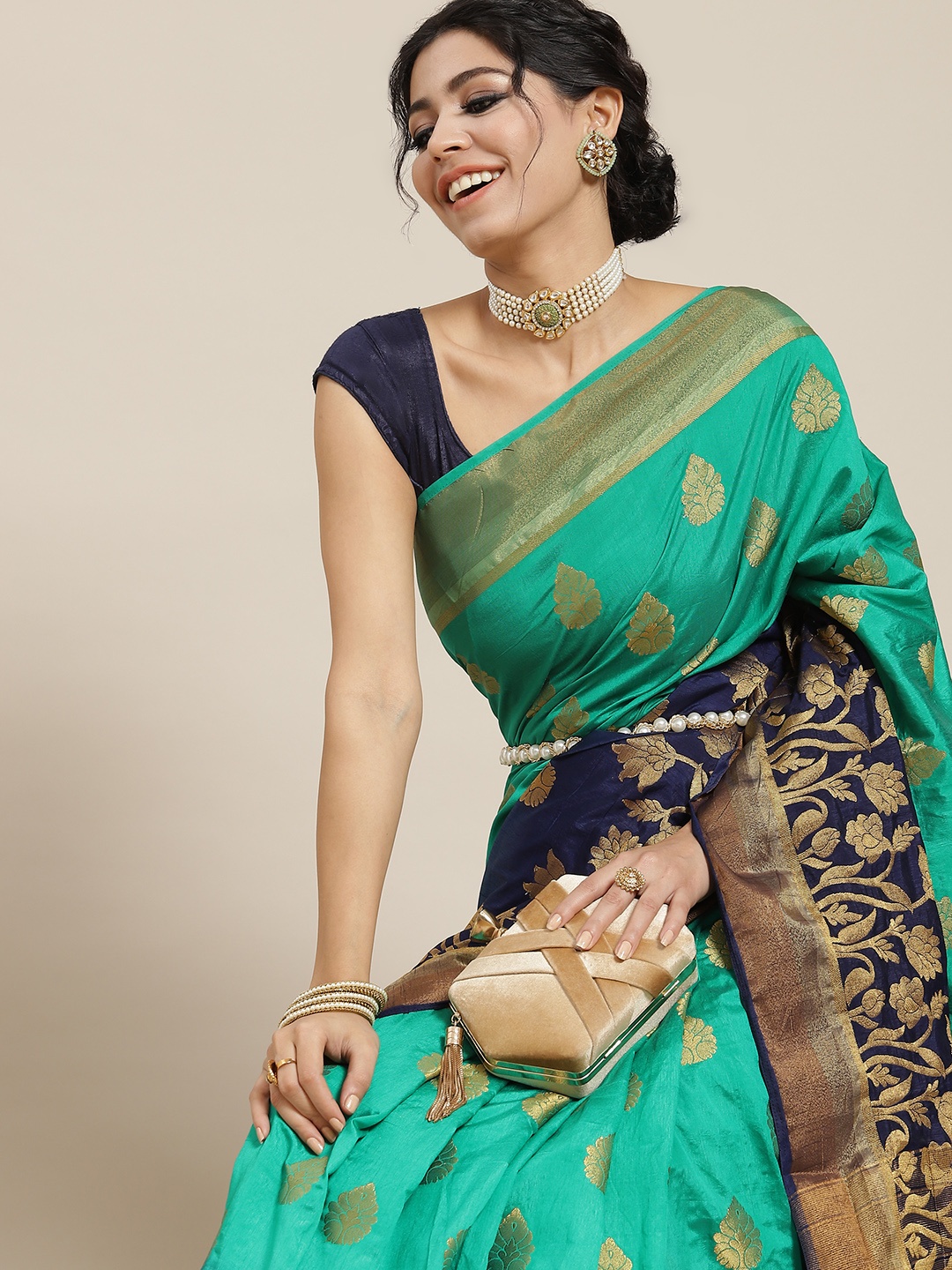 

Mitera Sea Green & Navy Blue Ethnic Motifs Woven Design Zari Saree